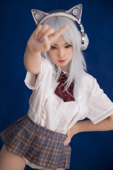 A sex doll in a school uniform with cat ear headphones poses against a blue background, embodying the aesthetic of the Hinata S30 158cm B Cup Sino Doll.