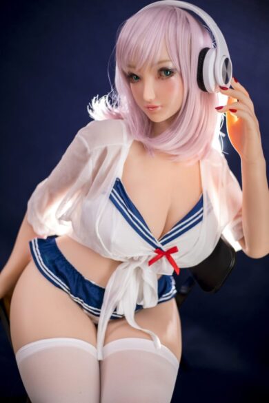 Yuki S22 155cm I Cup Sino Doll with pink hair and headphones in a sailor-style outfit and thigh-high stockings, set against a dark background