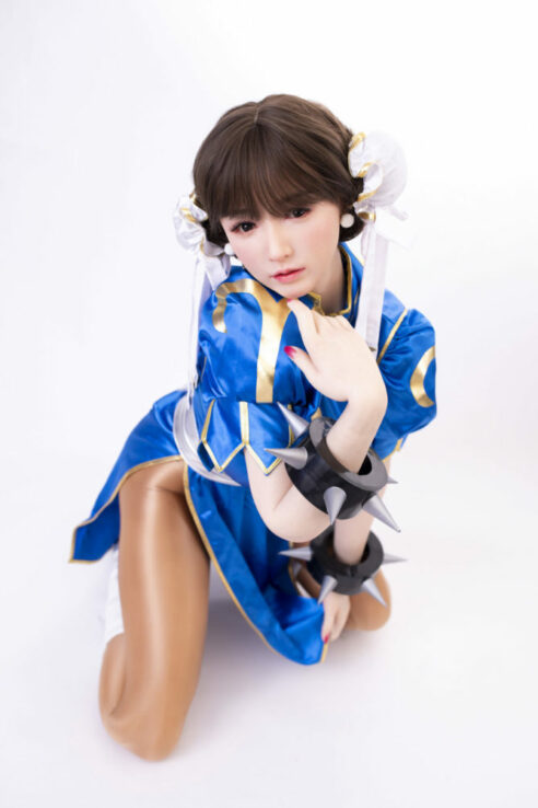 T1 Miyou T159 Anime Kungfu 5ft3 costume with spiked bracelets displayed on the floor against a white background capturing essence of a love doll