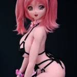 Anime-style sex doll of Tsukishima Izumi with pink hair, cat ears, and strappy black attire in a playful pose against a dark background.