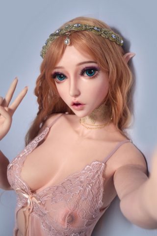 Chihiro – 150cm Elsa Babe silicone sex doll wearing a pink lace outfit and a decorative headband, posing with a peace sign.