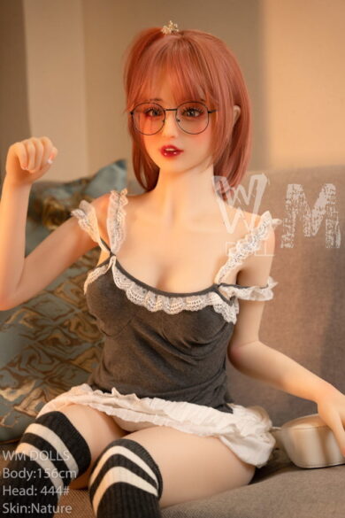 Tera 156cm D Cup Head #444 WM doll with red hair and glasses on a couch in a lace-trimmed dress, pillow in background