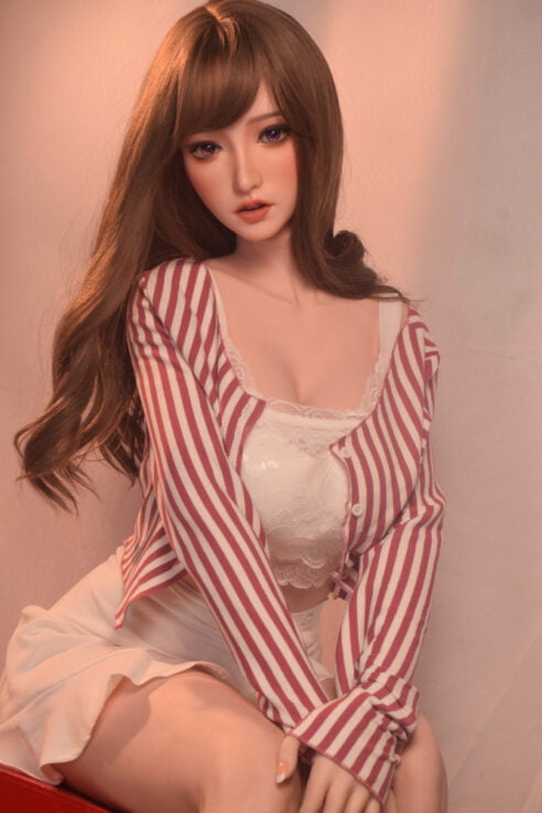 Yoshikawa Yu 165cm ElsaBabe L Breasts love doll with long brown hair in white lace top and striped cardigan on red surface