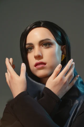 Lockne Death Stranding doll, featuring a realistic face with dark hair, wearing a black outfit and striking a posed expression.