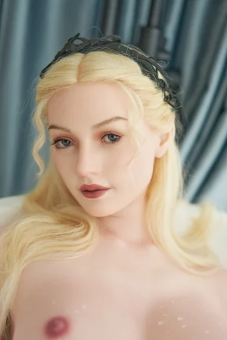 170cm C Cup Blonde GE76 Zelex doll with wavy blonde hair and a black headpiece, featuring a close-up of her face and soft makeup.