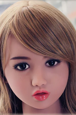 Doll 107 features long, straight blonde hair and large, expressive eyes with glossy lips.