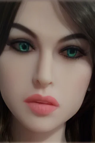 Doll 129 features a realistic face with green eyes, soft pink lips, and long brown hair.