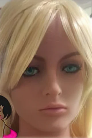 144cm doll with long blonde hair and blue eyes, featuring a neutral expression and a simple background.