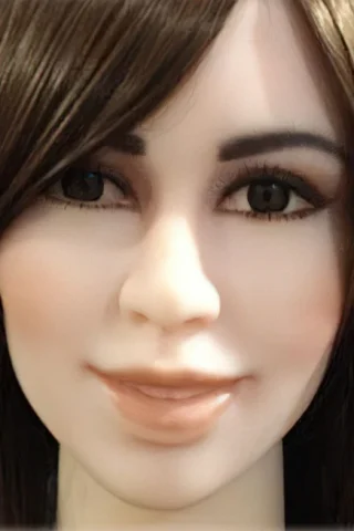 RealLady doll with long brown hair, featuring a soft smile and detailed facial features against a neutral background.