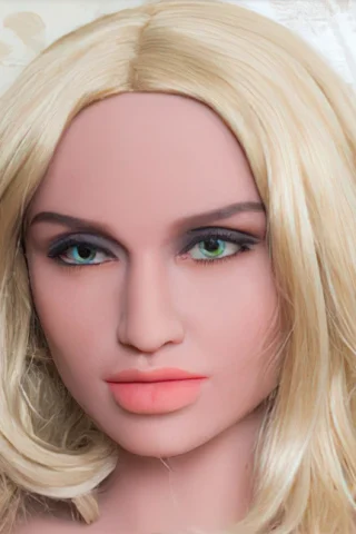 174cm doll with long blonde hair and green eyes, featuring a neutral expression and soft pink lips.