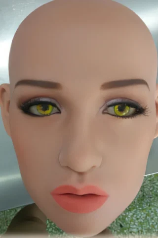 180cm doll with a bald head, featuring yellow-green eyes, subtle makeup, and full lips.