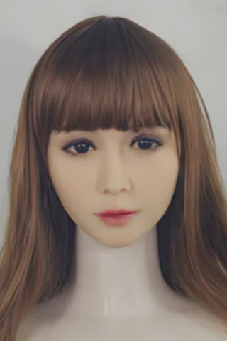 Doll head, featuring long brown hair with bangs and realistic facial features.