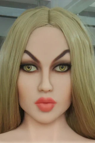 Doll 182 features long blonde hair, striking green eyes, and full lips in a neutral expression.
