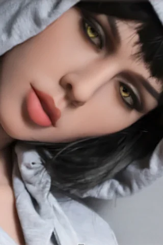 Doll with dark hair and yellow eyes wearing a gray hoodie, showcasing a close-up view of the face.