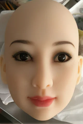 RealLady doll head with realistic features, including dark eyes, subtle lips, and smooth skin texture.
