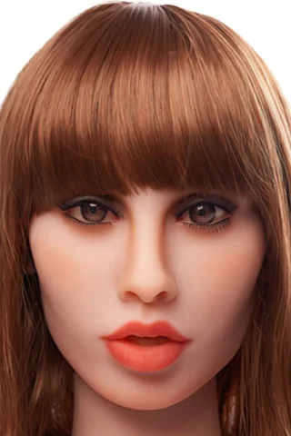 Doll head with long brown hair and bangs, featuring detailed facial features and bold lips.