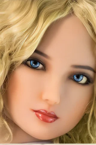 Doll 241 features wavy blonde hair, blue eyes, and a soft expression with full lips.