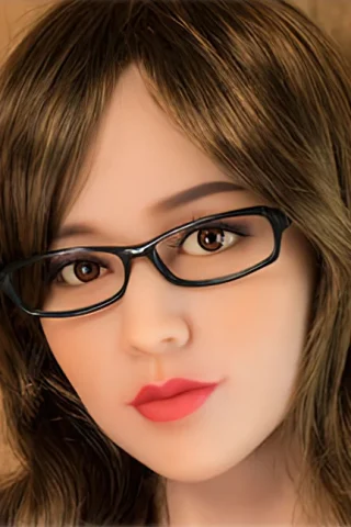 253 doll with brown hair and glasses, featuring a soft expression and light pink lips against a warm background.