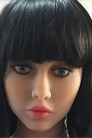 269 doll with long black hair and blue eyes, featuring a neutral expression and full lips.