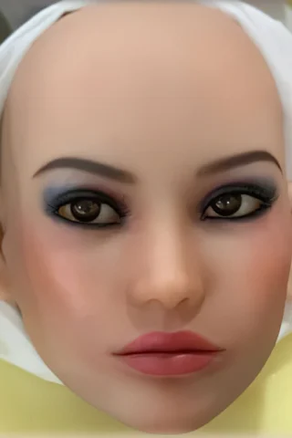 Doll head with realistic features, light skin tone, dark eyes, and subtle makeup details.