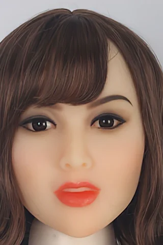 Doll head with long brown hair, dark eyes, and red lips, featuring a smooth, lifelike skin texture.