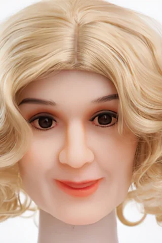 Head mannequin with blonde, wavy hair and a neutral expression, featuring realistic facial details and makeup.