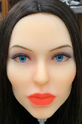 350 doll with long black hair and blue eyes, featuring bold red lips and a neutral expression.