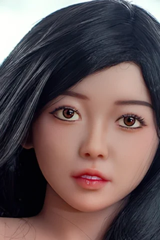 399 doll with long black hair and brown eyes, featuring a close-up of her face and soft skin texture.