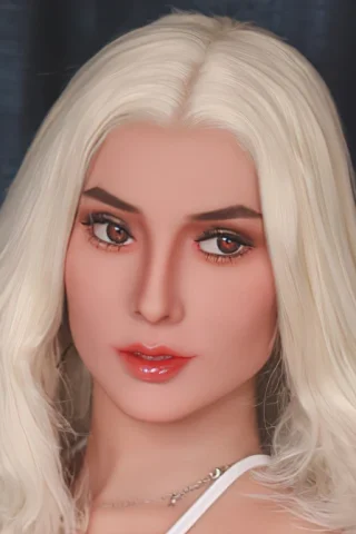 408 doll with long, wavy blonde hair and brown eyes, wearing a white top against a dark background.