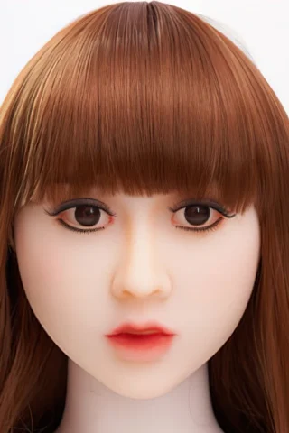 Doll head with long brown hair and straight bangs, featuring realistic facial details and dark eyes.