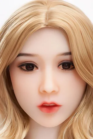 Doll 452 features long blonde hair, soft facial features, and dark eyes with a natural lip color.