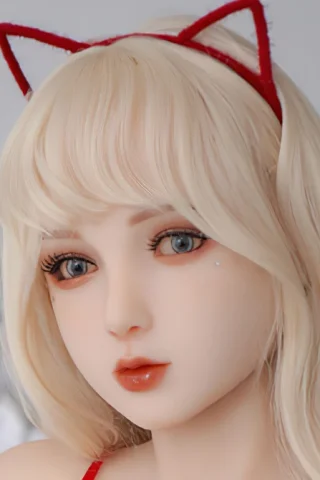 Doll with cat ears, featuring long blonde hair and blue eyes, wearing a red outfit.