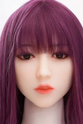 Doll with purple hair and pointed ears, featuring detailed facial features and soft makeup.