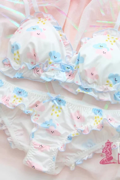 Cute Smiling Cloud Bikini with pastel cloud pattern and frilly edges on soft pink background