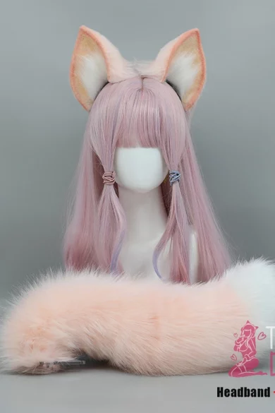 Posable love doll with pink wig, fox ears headband, and plush tail against gray background