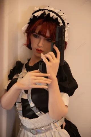 Iris 171cm D Cup Starpery dressed in a black and white maid outfit, holding a gun with a serious expression.