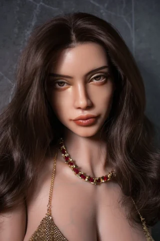 YL 158cm Isla Silicone doll with long dark hair, wearing a gold chain and red gemstone necklace against a textured gray background.