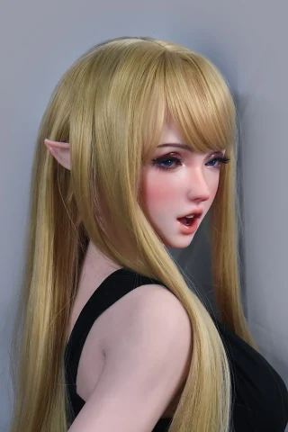 Shiina Tomoyo 150cm doll with long blonde hair and pointed ears, wearing a black sleeveless top, facing slightly to the side.
