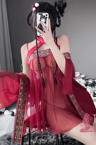 Tender Dolls outfit featuring a see-through red Arabic design with intricate patterns and flowing sleeves.