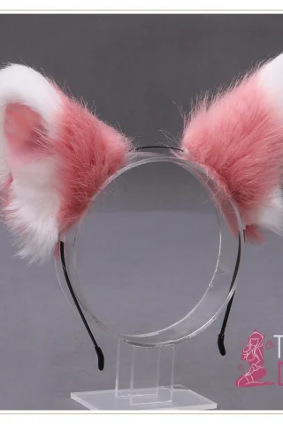 Furry Fluffy ears in pink and white on a black headband, displayed on a clear stand against a gray background.