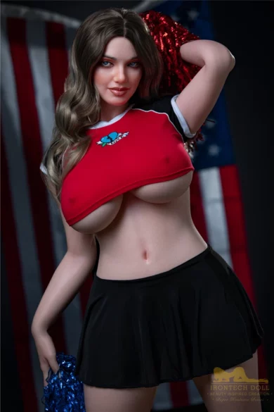 Ivy S27 160cm Irontech cheerleader doll in red top and black skirt with pom-poms, posed energetically against an American flag backdrop.