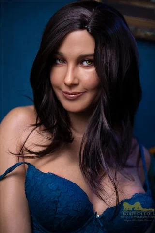 Irontech Doll, 160cm, featuring long dark hair and green eyes, wearing a blue lace bra against a dark blue background.