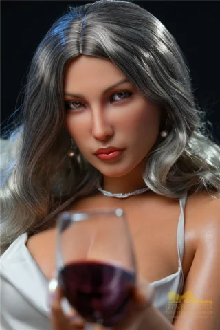Maria S22 164cm E Cup Irontech doll holds a glass of red wine, wearing a silver dress with wavy gray hair.