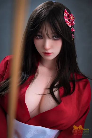 Miyuki S24 164cm E Cup Irontech Love Doll with long dark hair in red outfit and matching accessory against dark background