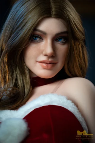 Ivy S27 165cm Irontech doll with long brown hair, blue eyes, and a red outfit with white fur trim.