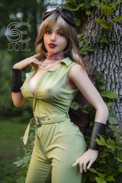 Blanche 163cm E Cup #110 SE Doll in green jumpsuit and goggles by a tree in a forest setting