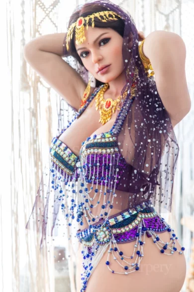 Jameela 165cm G Cup Starpery sex doll in ornate purple and gold costume with beaded accessories and intricate headdress, arms posed behind head