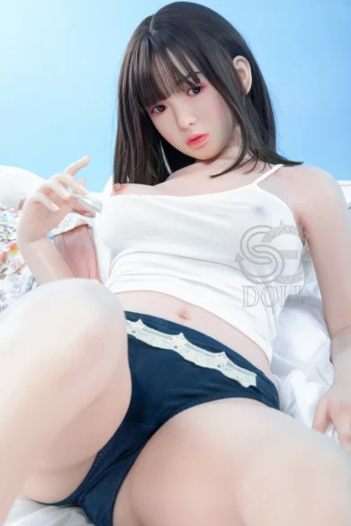 Pearl 160cm SE Doll with C cup #103 SED139, long hair, white tank top, dark underwear, posed on bed