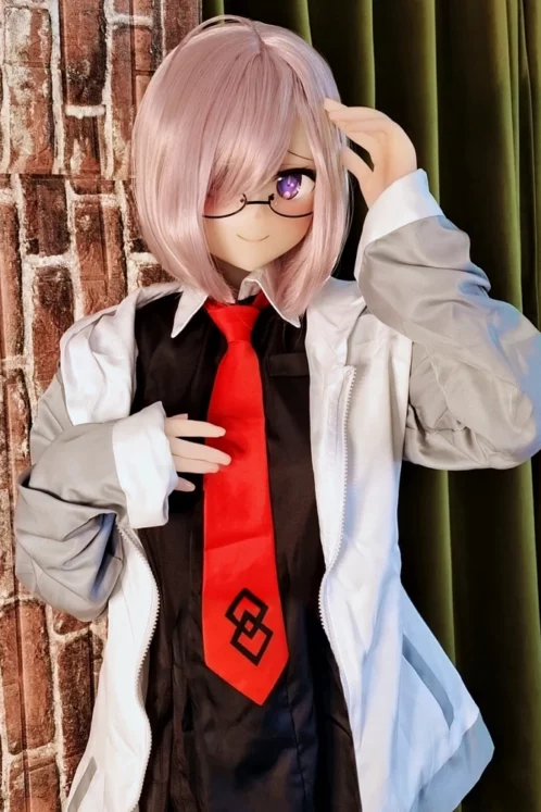 Seiba 155cm C Cup #76 Head love doll with anime-inspired design, pink hair, glasses, red tie, and jacket against brick wall and curtain backdrop