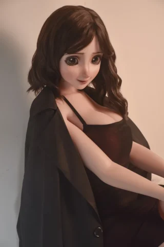 Jenny Miller 148cm sits with a black coat draped over her shoulders, wearing a fitted dress, with long wavy hair and large eyes.